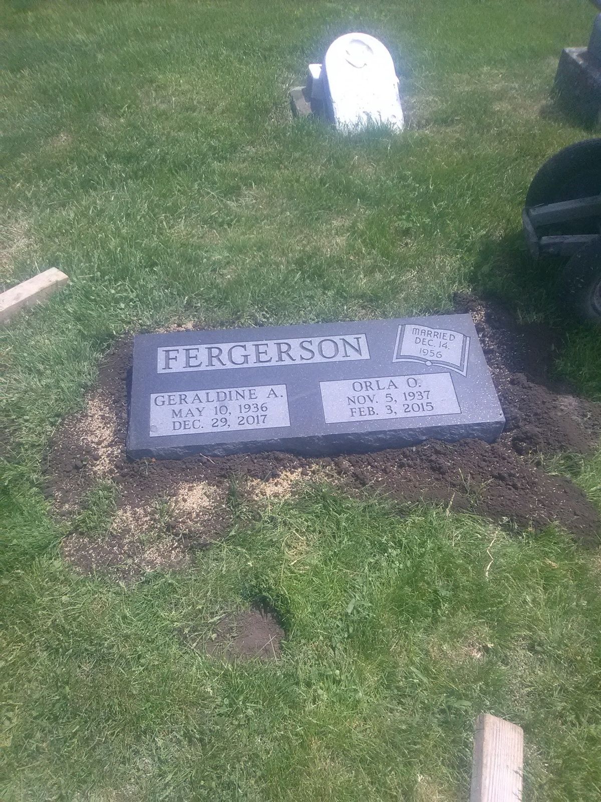 Grey granite companion bevel marker with an open book panel recording a marriage date